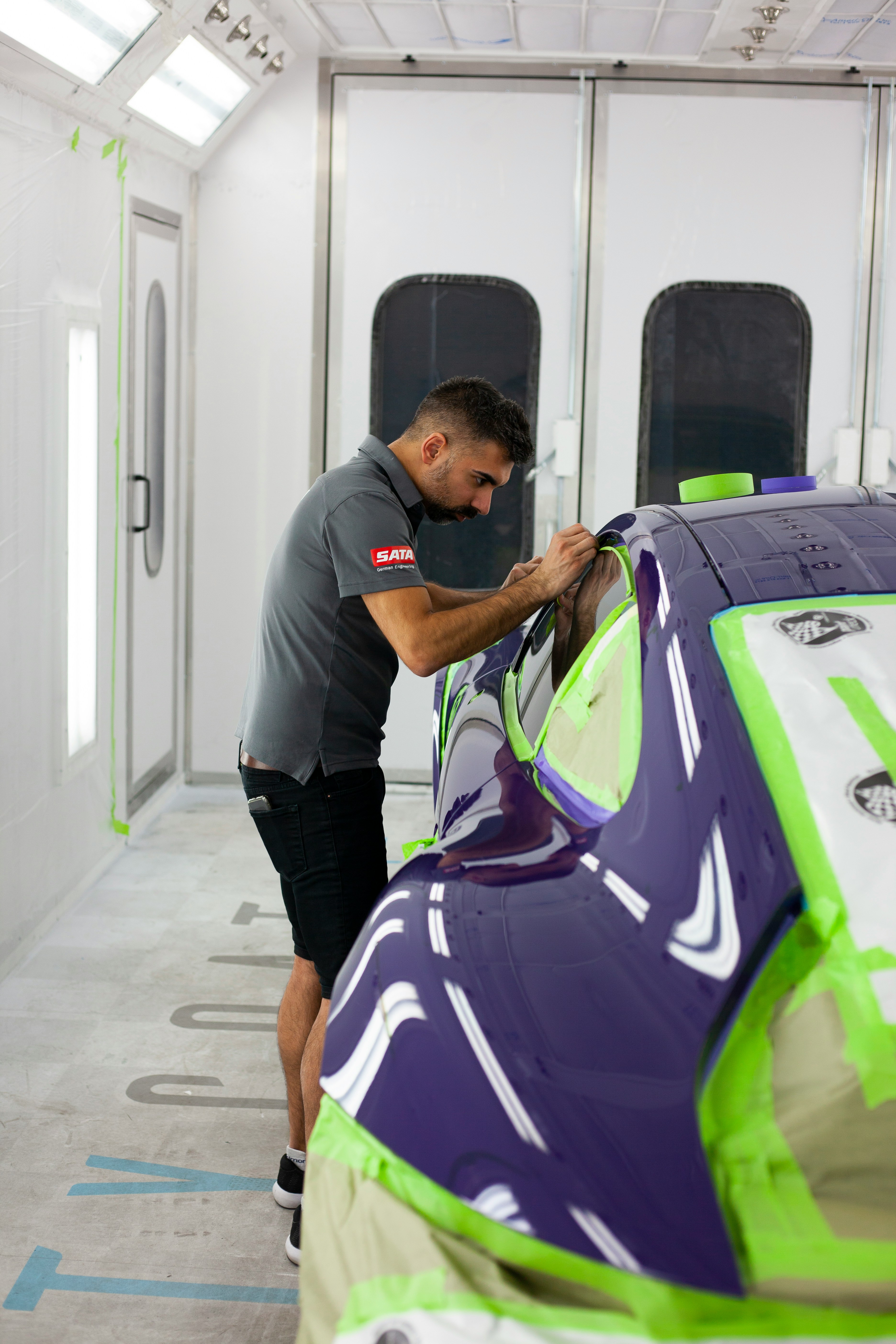 Vehicle under studio lighting during detail